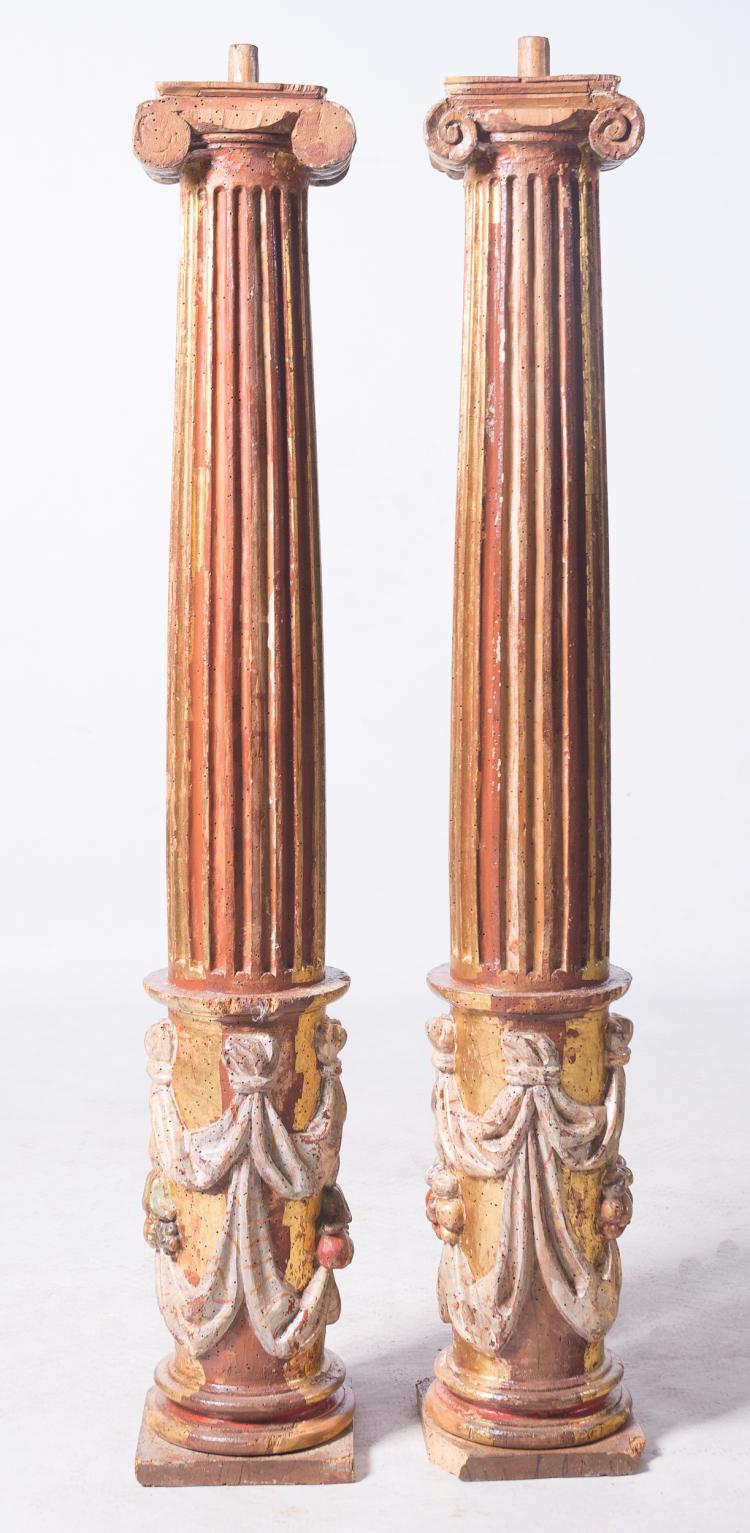 Pareja de columnas con personajes en madera tallada, dorada y policromada. Escuela castellana. Renacimiento. Siglo XVI.